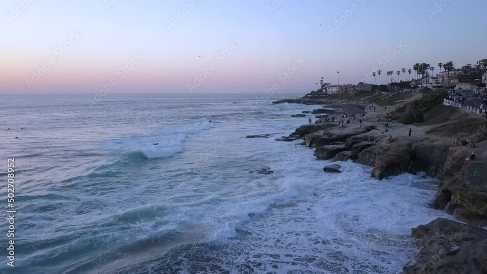 slow motion along the coastline people on the cliff Wonderful aerial view panorama curve flight drone footage at sunset San Diego Windansea Beach USA 2018. Cinematic view from above by Philipp Marnitz slow motion along the coastline people on the cliff Wonderful aerial view panorama curve flight drone footage at sunset San Diego Windansea Beach USA 2018. Cinematic view from above by Philipp Marnitz