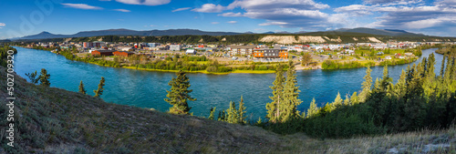 Panorama of the city of Whitehorse, Canada, with the Yukon river in the foreground