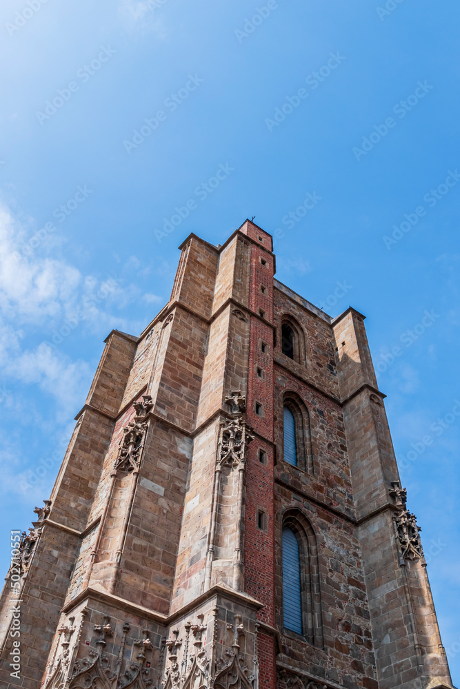 The bell tower at the gothic church in Nysa. Basilica of st. James the Apostle and St. Agnieszka in Nysa.