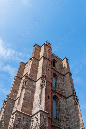 The bell tower at the gothic church in Nysa. Basilica of st. James the Apostle and St. Agnieszka in Nysa.
