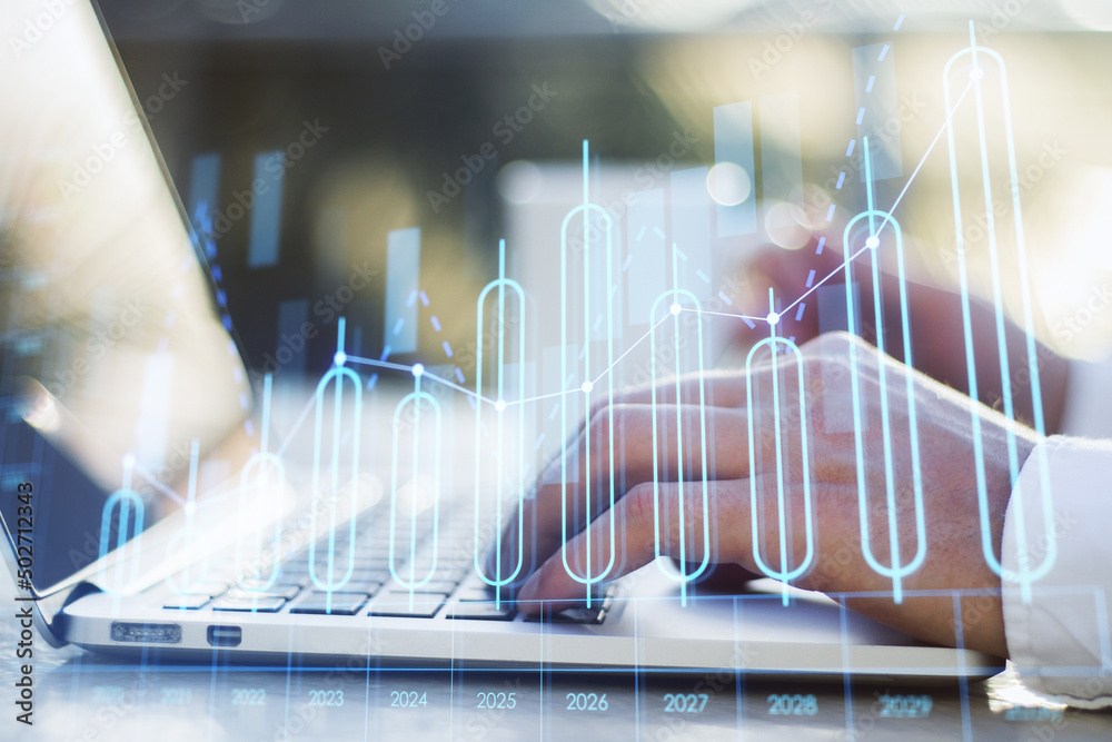 Close up of businessman hands using laptop with growing annual business chart report on desktop with coffee cup and blurry outdoor background. Analysis and company concept. Double exposure. Close up of businessman hands using laptop with growing annual business chart report on desktop with coffee cup and blurry outdoor background. Analysis and company concept. Double exposure.