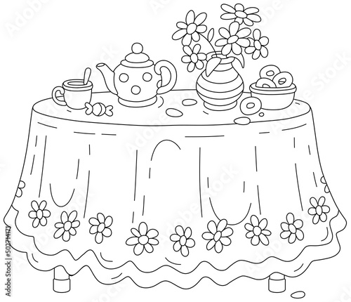 Round kitchen table with a beautiful tablecloth, a vase with summer flowers and a tea set with tasty bagels in a kitchen at a dacha, black and white outline vector illustration for a coloring book pag