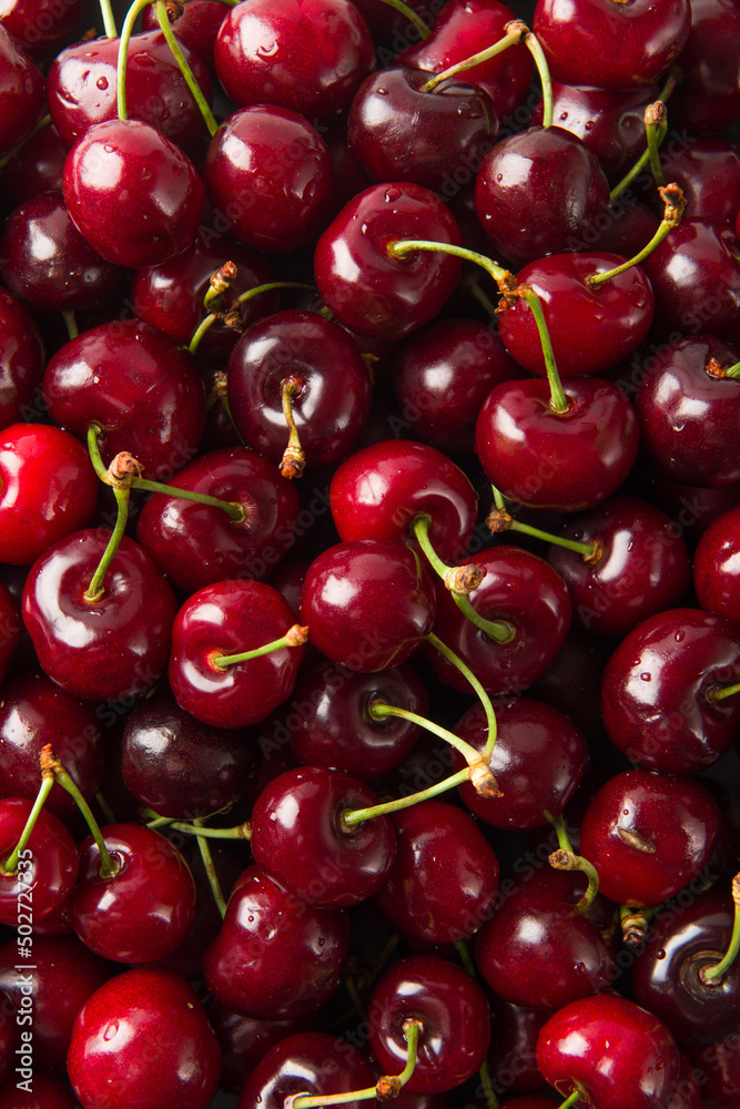 Close up of pile of ripe cherries background Close up of pile of ripe cherries background