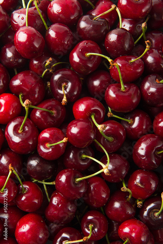 Close up of pile of ripe cherries background