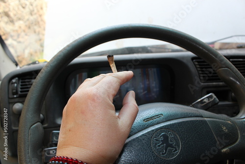 фотографія fumer ou  conduire