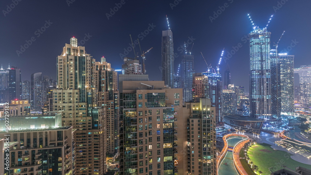 Fototapeta premium Panorama of downtown Dubai city aerial night timelapse