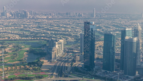 Big crossroad junction between JLT district and Dubai Marina intersected by Sheikh Zayed Road aerial timelapse.