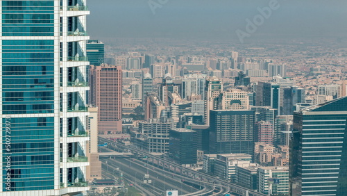 Billede på lærred Dubai Aerial view showing al barsha heights and greens district area timelapse