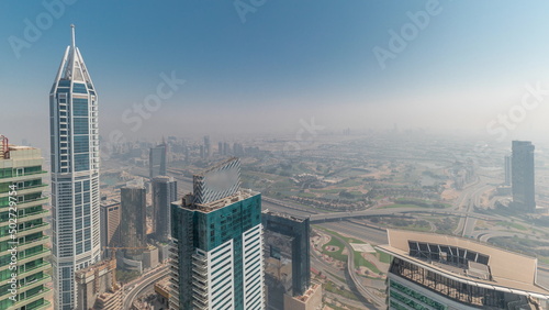 Canvas Print Rare early morning winter fog above the Dubai Marina skyline and skyscrapers rooftops aerial timelapse