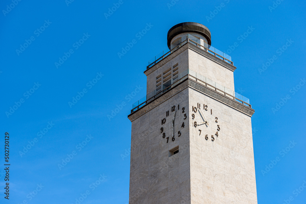 Brescia downtown. Clock Tower of the Fascist Revolution (Torre della Rivoluzione Fascista), 1927-1932, by the Roman architect Marcello Piacentini (1881-1960), Piazza della Vittoria, Lombardy, Italy.