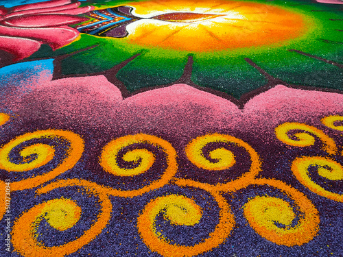 SELANGOR, MALAYSIA -OCTOBER 29, 2021: Attractive Deepavali Kolam design. Built using colored rice by experts and its design is based on elements in Indian society. Colorful and beautiful.  photo