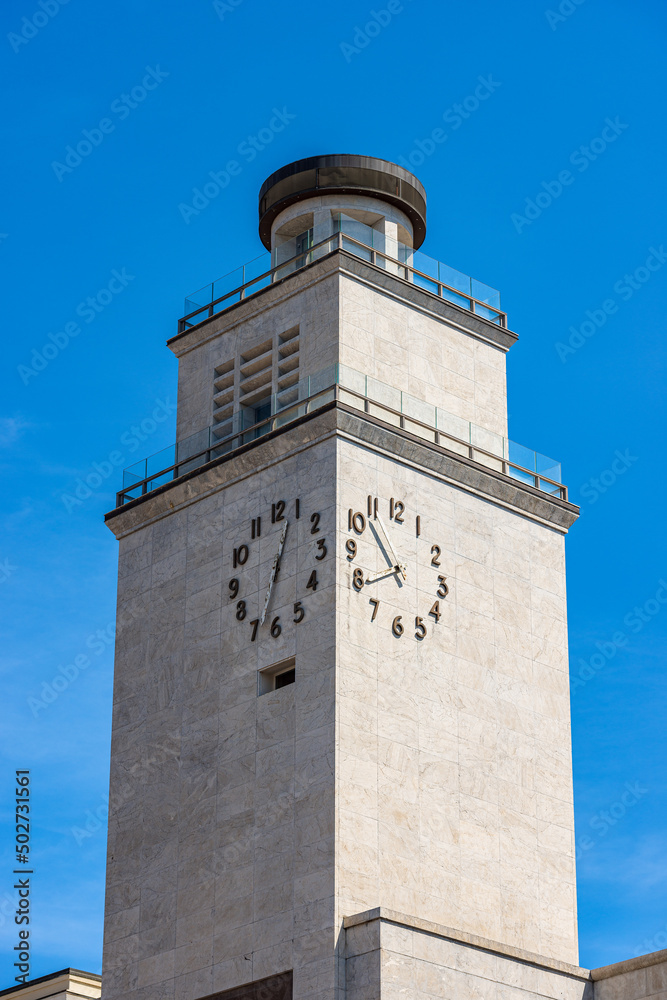 Brescia downtown. Clock Tower of the Fascist Revolution (Torre della Rivoluzione Fascista), 1927-1932, by the Roman architect Marcello Piacentini (1881-1960), Piazza della Vittoria, Lombardy, Italy.