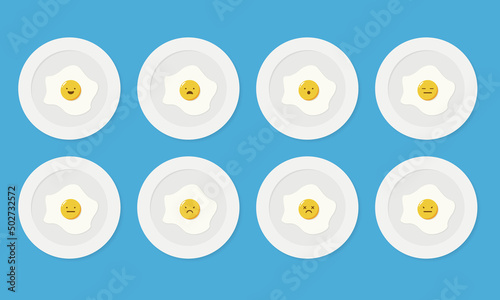 Set of fried eggs emoji face expression smiles on plate