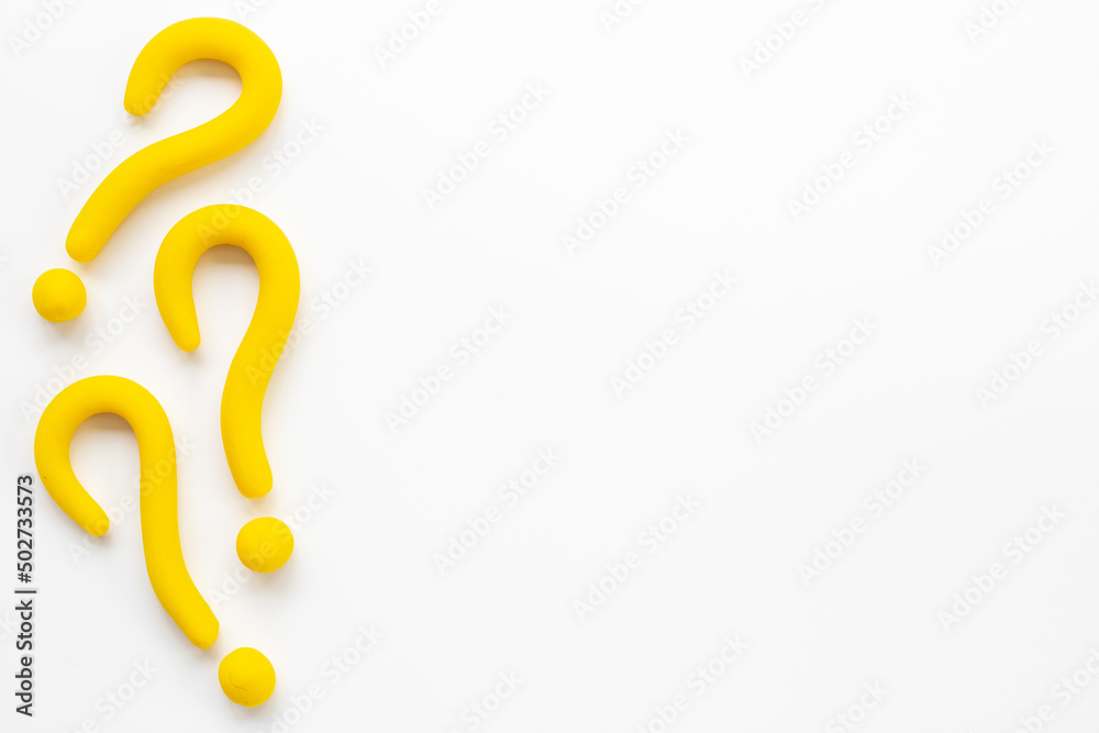 Question mark sign made of plasticine. FAQ and help concept Question mark sign made of plasticine. FAQ and help concept