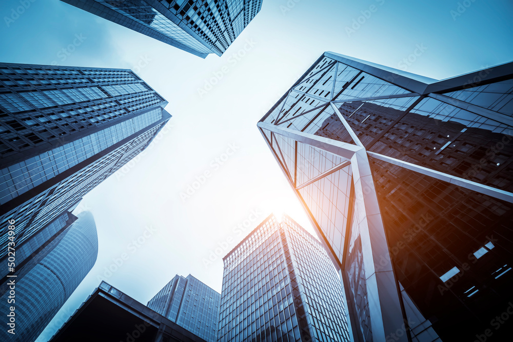 Fototapeta premium Outdoor financial district office building facade and partial view