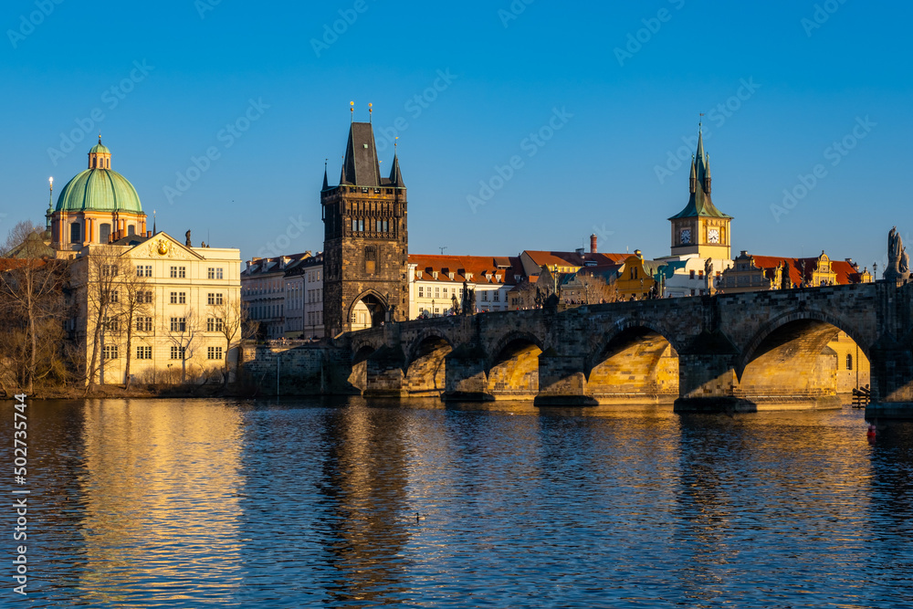 Lesser Bridge Tower and a Charles Bridge in Prague ,Czech Republic .
