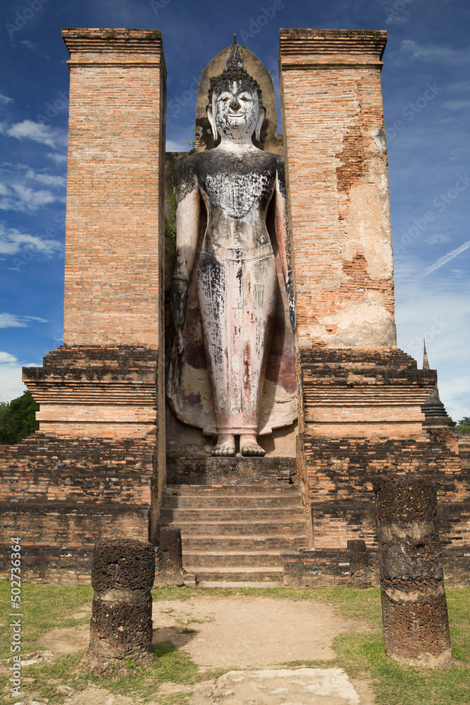 Standing Buddha at Wat Mahathat in Sukhothai, Thailand