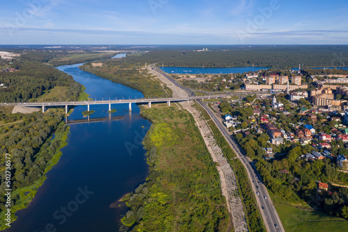 Aerial view of Gagarin bridge across Oka river on summer sunny day. Kaluga, Kaluga Oblast, Russia.