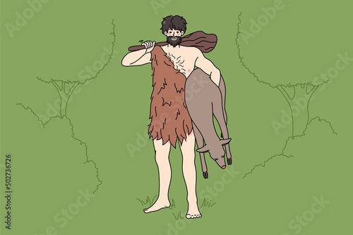 Caveman from stone age in traditional tribe clothing hold prey in hands. Primitive archaic man with cudgel. Tribal times. Flat vector illustration, cartoon character. 