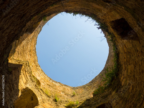 Akkerman fortress. Medieval castle near the sea. Stronghold in Ukraine. Ruins of the citadel of the Bilhorod-Dnistrovskyi fortress, Ukraine. View of the blue sky from the well of the tower. 