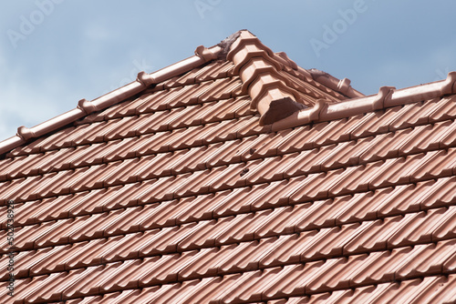 new red tiles roof and blue sky