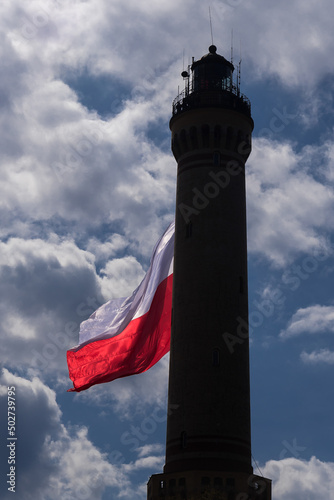 STATE FLAG - Flag of Poland at the lighthouse in Swinoujscie