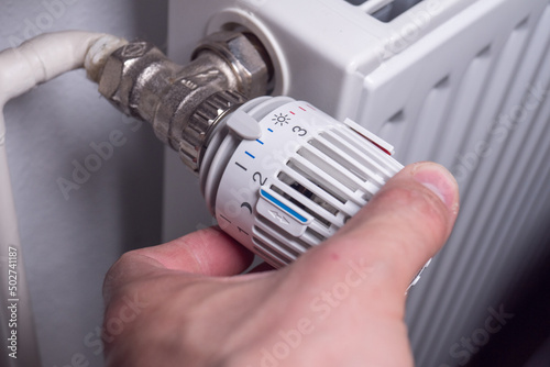 reduce the temperature on thermostat to save energy heating costs