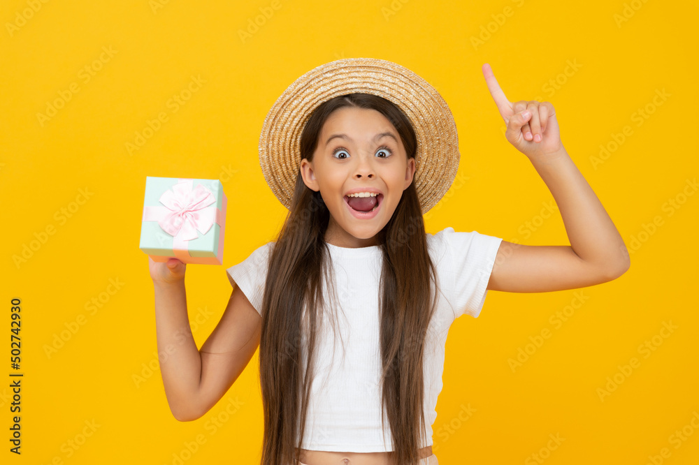 inspired teen child hold present box on yellow background