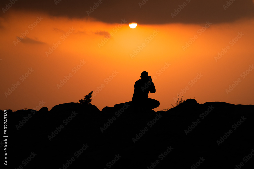 Sunset and photographer