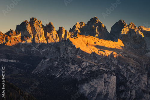 Autumn in the Italian Dolomites. The most beautiful time of the year to visit this place. Beautiful colors and breathtaking views. Mountain peaks above the valleys.