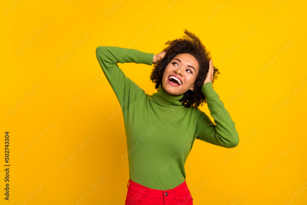 Portrait of attractive dreamy cheerful wavy-haired girl great idea solution isolated over bright yellow color background Portrait of attractive dreamy cheerful wavy-haired girl great idea solution isolated over bright yellow color background