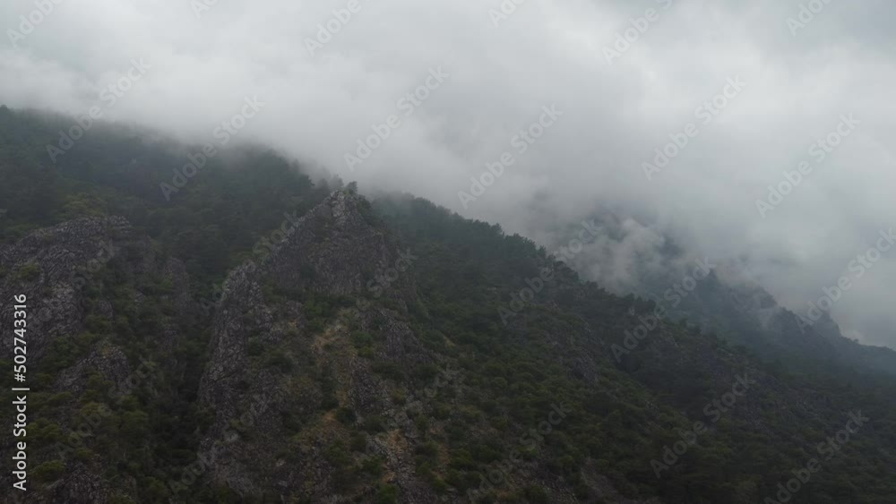 Mountain valley in rain clouds. High quality 4k footage Mountain valley in rain clouds. High quality 4k footage