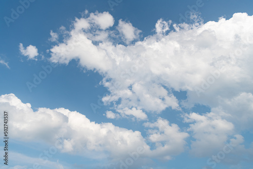 blue cumulus sky with white clouds in daylight