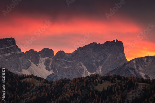 Autumn in the Italian Dolomites. The most beautiful time of the year to visit this place. Beautiful colors and breathtaking views. Mountain peaks above the valleys.