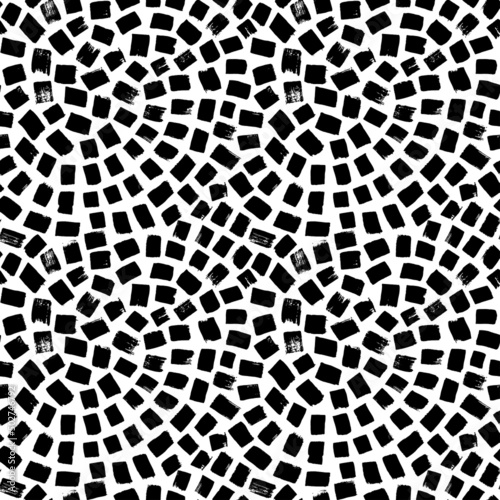Broken tiles mosaic seamless pattern. Hand drawn black grunge texture with small dashes. Endless rock concrete texture. Terrazzo floor print with swirl. Modern black and white mosaic background. 