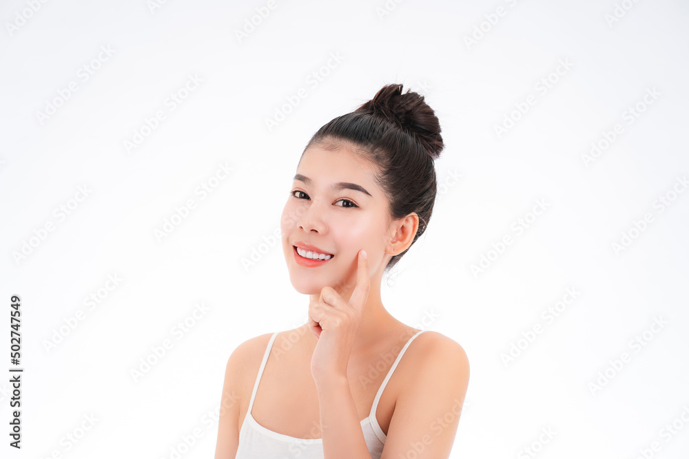 Portrait of attractive asian young woman with beauty skin and face isolated on white background. Healthy skin and face care concept. Portrait of attractive asian young woman with beauty skin and face isolated on white background. Healthy skin and face care concept.