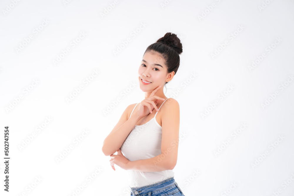 Portrait of attractive asian young woman with beauty skin and face isolated on white background. Healthy skin and face care concept. Portrait of attractive asian young woman with beauty skin and face isolated on white background. Healthy skin and face care concept.