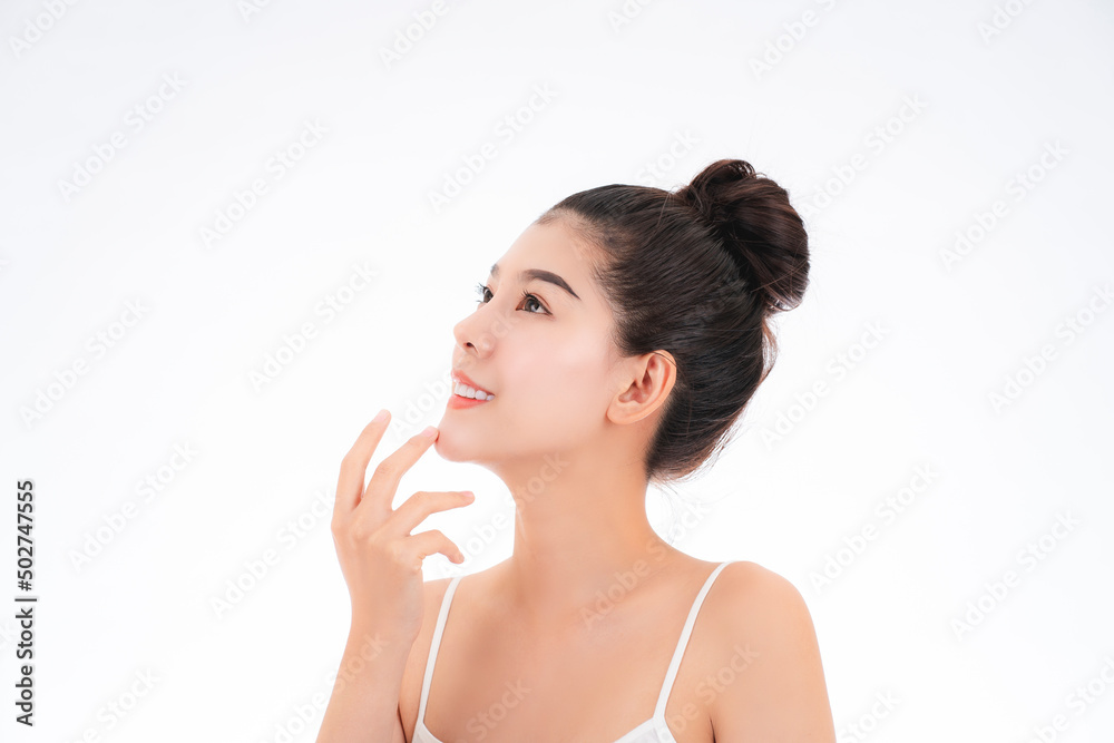 Portrait of attractive asian young woman with beauty skin and face isolated on white background. Healthy skin and face care concept. Portrait of attractive asian young woman with beauty skin and face isolated on white background. Healthy skin and face care concept.