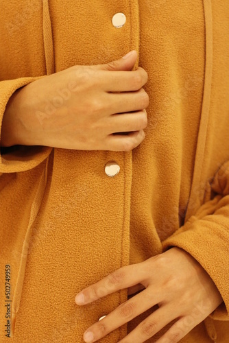 details of the thick yellow jacket