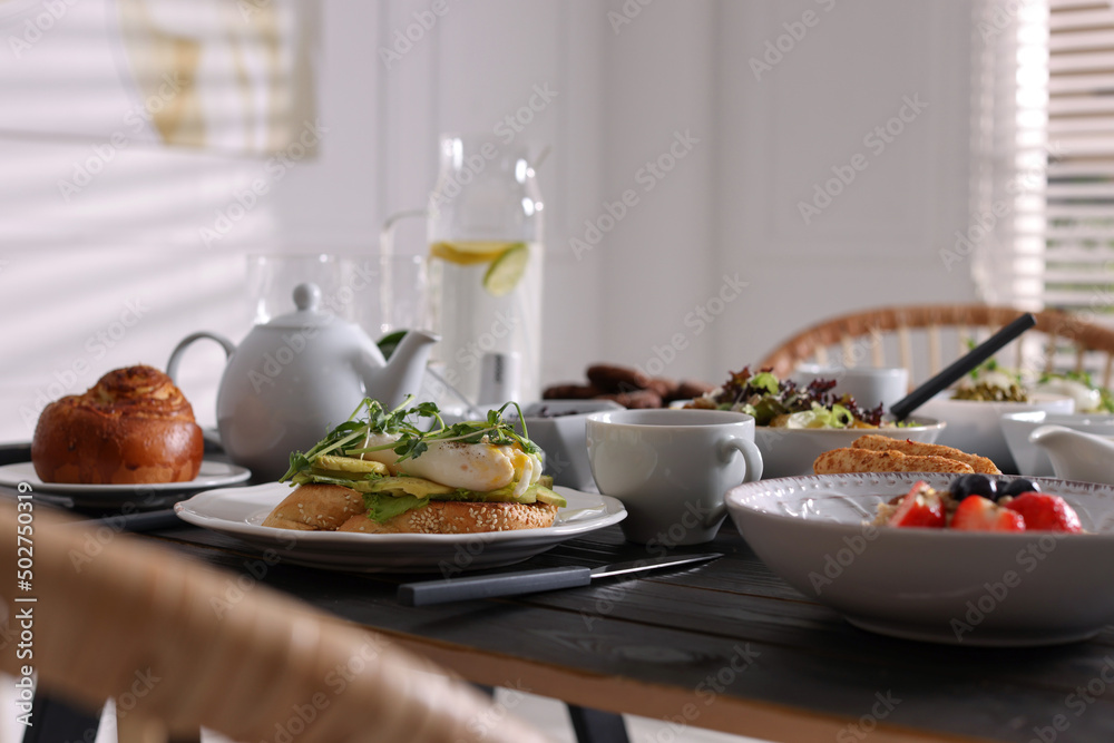 Many different dishes served on buffet table for brunch Many different dishes served on buffet table for brunch