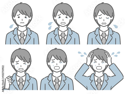 泣く表情の強弱　スーツの若い男性