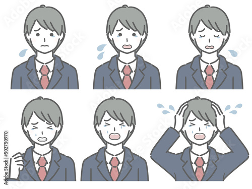 泣く表情の強弱　スーツの若い男性