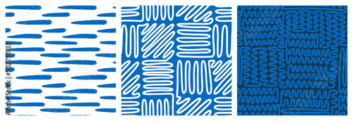 Abstract blue and white seamless pattern set for textile print with endless maze hand drawn designs.