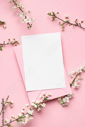 Blank greeting or invitation card mockup with flowers