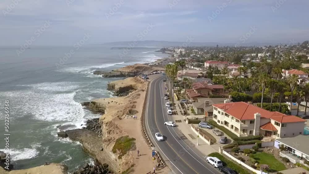 Slow motion from panorama of coastline to cave. Daring aerial view flight pedestal boom down drone footage at San Diego surf Point Spot Smugglers Cave USA 2018. Cinematic view above by Philipp Marnitz Slow motion from panorama of coastline to cave. Daring aerial view flight pedestal boom down drone footage at San Diego surf Point Spot Smugglers Cave USA 2018. Cinematic view above by Philipp Marnitz