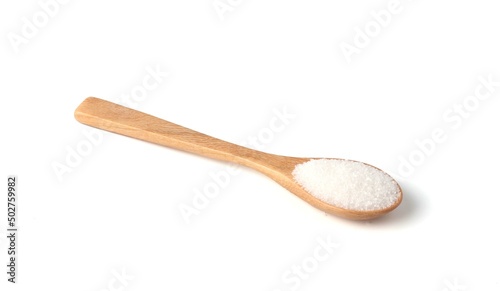 White sugar in wooden spoon isolated on white background