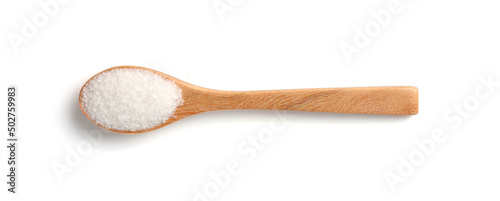 White sugar in wooden spoon isolated on white background