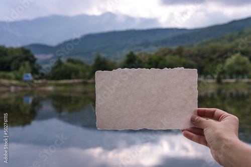 Fototapeta Naklejka Na Ścianę i Meble -  Mockup greeting cards, top view, flatlay, landscape and  lake background, place for your text. For presentation your art, wedding greeting cards.