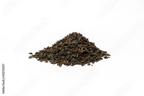 Tea. Dry tea leaves isolated on white background.