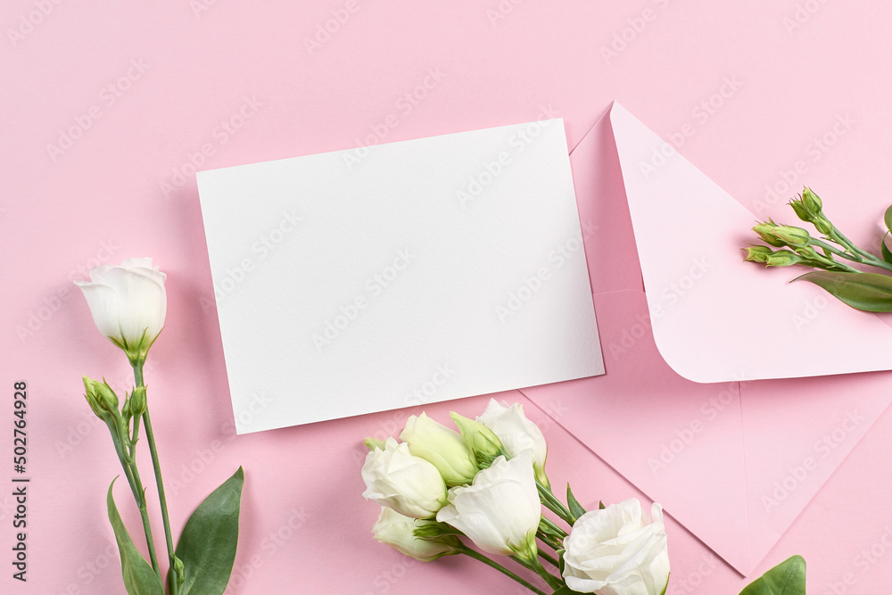 Invitation card mockup with envelope and white eustoma flowers